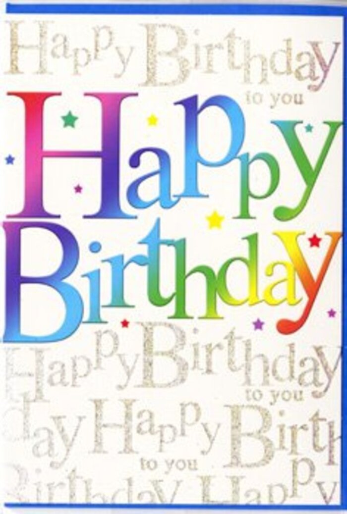 In the scene, a richly designed birthday card stands upright, radiating the bright, easygoing cheer you might associate with a Creekmouth celebration by the water. The most striking feature is the large Happy Birthday message running across the front in rounded, slightly raised-looking letters that have a soft, almost cushiony character. These letters are drenched in a rainbow wash of colour, with tones that shift smoothly from one to the next: dark red into magenta, fiery orange into mellow yellow, then through grassy green, aqua, and deep ocean blue before settling into notes of purple. The gradient feels carefully blended, not harsh, giving the sense of colour drifting gently across the card, much like the sky changing over the Thames at sunset. The surface of the letters appears glossy and polished, catching narrow streaks of light that give them dimension. Behind this central greeting, the entire backdrop is covered in a repeating pattern of Happy Birthday to you in fine, looping script. The script is a warm metallic gold, shining subtly, like sunlight dancing on water, and its repetition creates a soothing rhythm, as if the phrase is being sung softly again and again. Scattered among the elegant lines of gold are tiny, brightly coloured flecks and star shapes that evoke festive confetti or sparkles in a party streamer. The overall aesthetic is joyful yet sophisticated, combining bold colour with delicate detail. One can picture this card chosen in Creekmouth to sit alongside a fresh arrangement of flowers, offering not just a written greeting but a visual expression of happiness, thoughtfulness, and celebration.